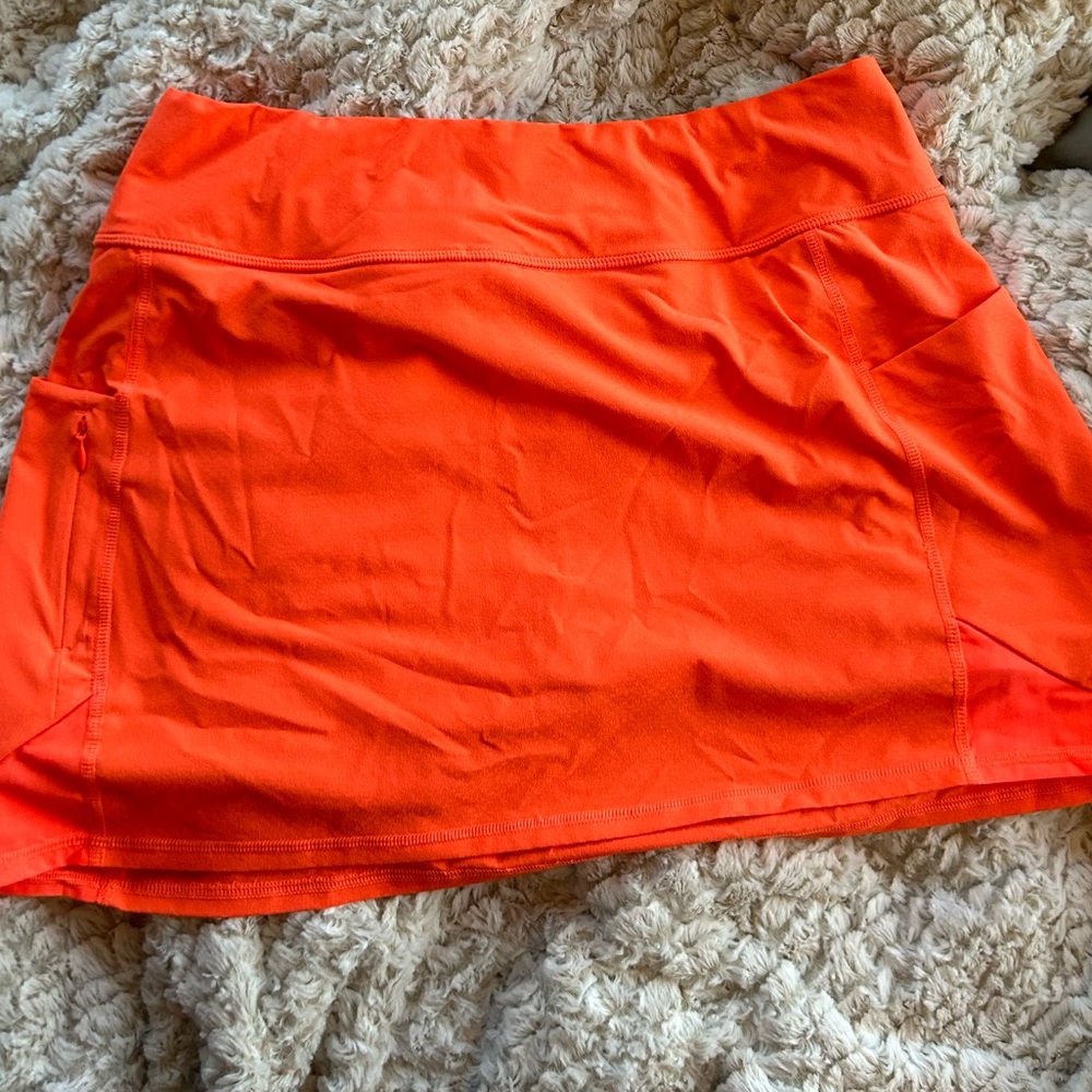 Athleta orange skort with pockets